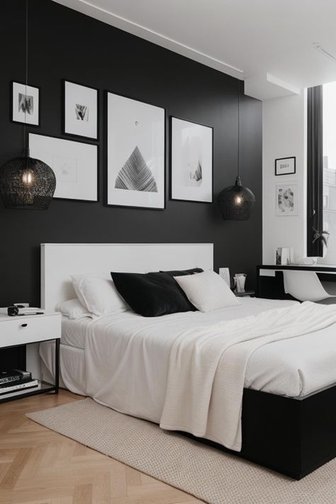 a bedroom with black and white decor, pictures on the wall, and a large bed