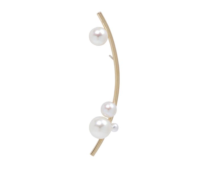 With a flourish of whimsical elegance and modern simplicity, this single Sophie Bille Brahe earring has a fluid, sculptural presence. Meant for the right lobe, the 14K yellow gold earring curves outward and is set with round, white freshwater pearls at its top and bottom. Statement-making no matter what earring you wear on the other side.14K yellow gold and pearl earring : 2 1/16" x 1/2"freshwater pearls : vary : 3mm diameter to 9mm diameter each14K yellow gold post backs*price is for SINGLE ear Modern White Single Pearl Earring, Modern Single Ear Climber For Formal Occasions, Modern Single Ear Climbers For Formal Events, Elegant Gold Ear Cuff With Pearl Drop, White Elegant Ear Climbers For Anniversary, Elegant White Ear Climbers For Anniversary, Elegant Gold Ear Climbers For Wedding, White Pearl Drop Ear Cuff For Wedding, Elegant Ear Climbers With Ear Wire For Wedding