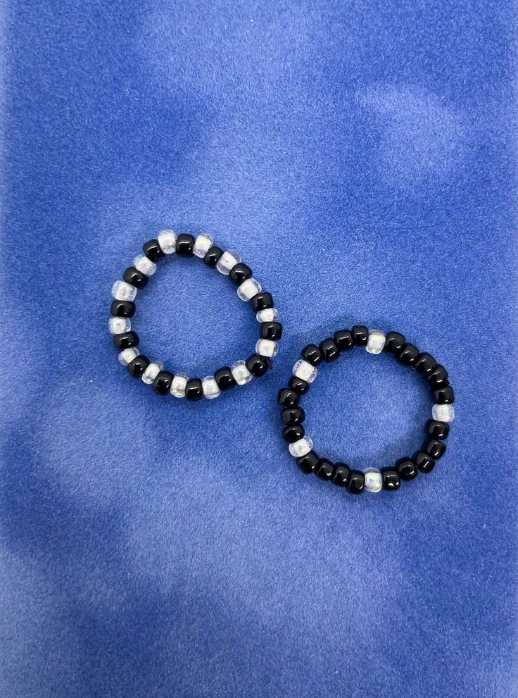 Get two beautiful beaded rings for one!  These rings are elastic so they'll fit you perfectly Black Rings With Round Beads As Gifts, Black Beaded Rings For Gift, Rings Beaded, Homemade Bracelets, Rings Black, Beaded Rings, Black Rings, Rings Statement, Light Purple