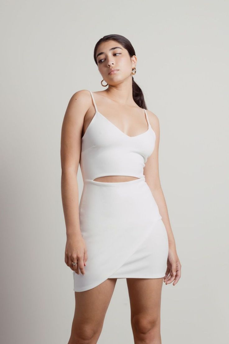 The latest TOBI new arrival for spring! Look fabulous in this White Front Cut Out Bodycon Mini Dress new arrival. Explore all TOBI new arrivals including white dresses, cut out dresses, bodycon dresses, and mini dresses. Shop new arrival dresses from TOBI. Fall Clothing Essentials, Fall Mini Skirt, White Lace Bodycon Dress, White Cut Out Dress, Boho Festival Outfit, White Lace Bodycon, Choker Chain Necklace, Little White Dress, Sequin Dresses