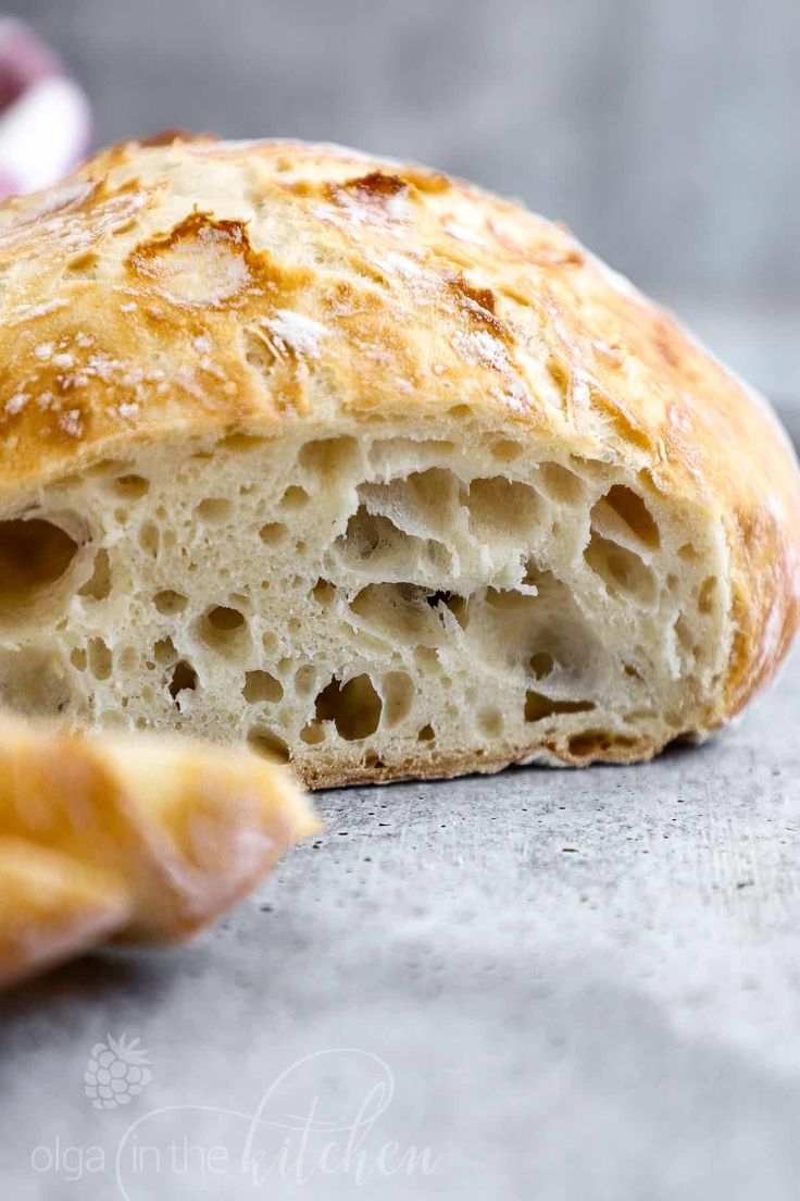 a piece of bread that has been cut in half and is sitting on the table