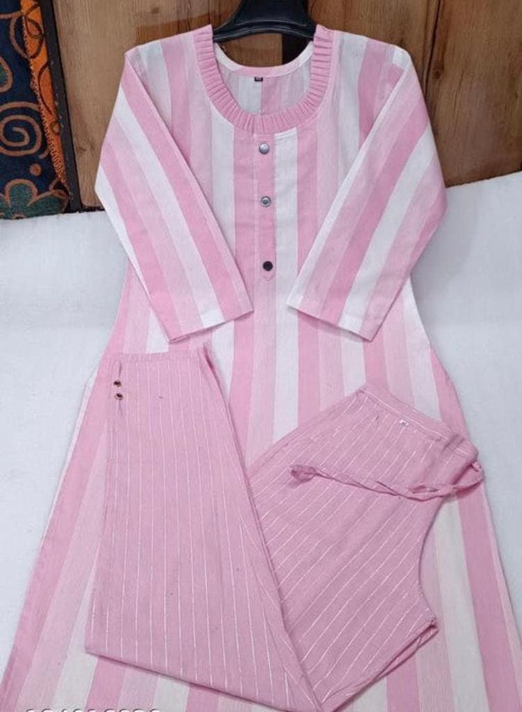 Name: kurti set Kurta Fabric: Khadi Cotton Bottomwear Fabric: Khadi Cotton Fabric: Khadi Cotton Sleeve Length: Three-Quarter Sleeves Set Type: Kurta With Bottomwear Bottom Type: Pants Pattern: Striped Net Quantity (N): Single Sizes: M, L (Bust Size: 40 in, Shoulder Size: 14.5 in, Kurta Waist Size: 32 in, Kurta Hip Size: 42 in, Kurta Length Size: 38 in, Bottom Waist Size: 32 in, Bottom Hip Size: 42 in, Bottom Length Size: 37 in)  XL (Bust Size: 42 in, Shoulder Size: 15 in, Kurta Waist Size: 34 in Khadi Clothes For Women, Pink Anarkali Cotton Lawn Suit, Casual Pink Kurta For Summer, Casual Pink Kurta For Festive Season, White Cotton Sharara With Self Design, Casual Pink Summer Kurta, Festive Summer Straight Kurta Pant Set, Pink Straight Kurta For Summer, Semi-stitched Sets For Festive Summer