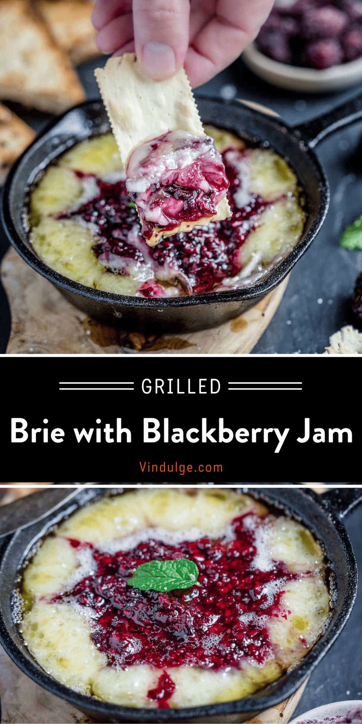 a hand dipping a piece of bread into a blackberry jam in a cast iron skillet