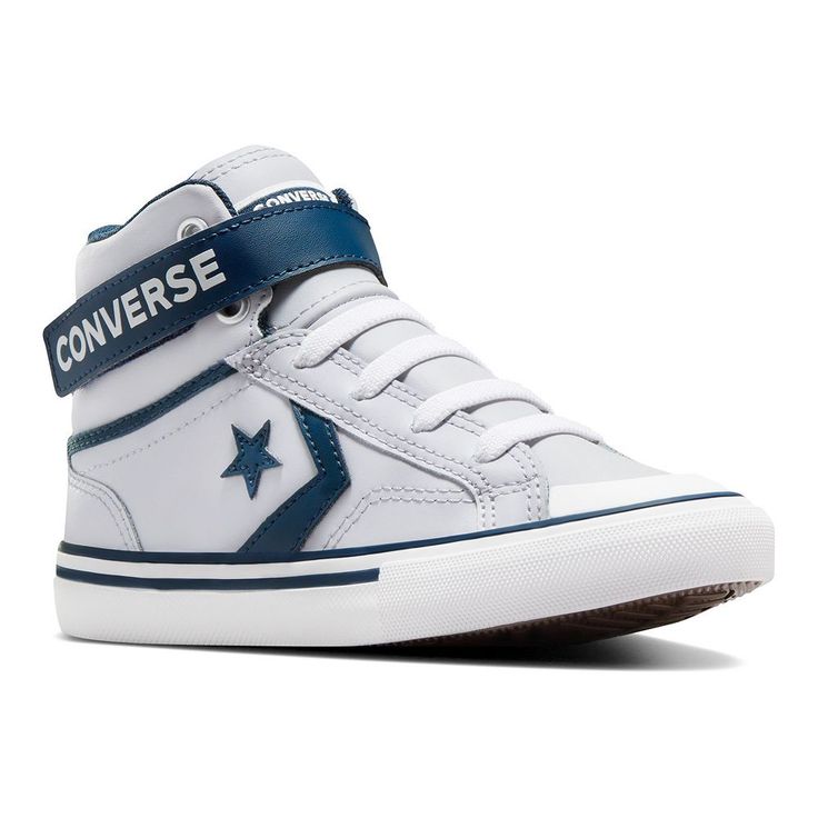 Your little one will have a great time playing in these Converse Pro Blaze little kid boys' leather easy-on strap shoes.Click this FOOTWEAR GUIDE to find the perfect fit and more! Your little one will have a great time playing in these Converse Pro Blaze little kid boys' leather easy-on strap shoes.Click this FOOTWEAR GUIDE to find the perfect fit and more! TECHNOLOGIES & FEATURES Basketball-inspired classic Adjustable ankle strap and elastic laces Padded tongue and collarDETAILS Leather upper Mesh lining Rubber outsole Foam midsole and footbed Plain toe Pull-on Elastic and hook-and-loop tape closure Multidirectional outsole Spot clean Imported Size: 1. Color: Ghost Town. Gender: male. Age Group: kids. Shoe Size Chart Kids, New Converse, Shoe Inspo, Ghost Town, Strap Shoes, Boy Shoes, Elastic Laces, Shoe Size Chart, Converse Shoes