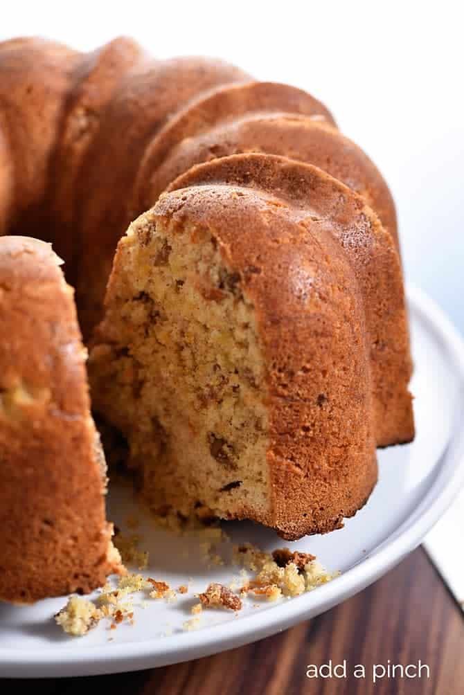 a bundt cake is cut into pieces on a plate