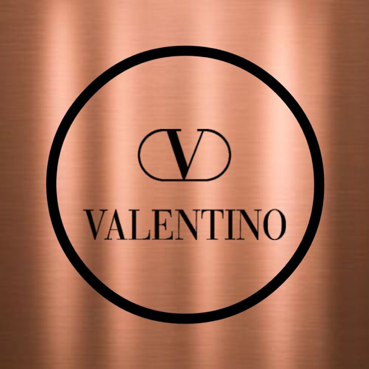 the logo for valentino is shown on a metallic background