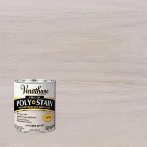 a white paint can sitting on top of a wooden table