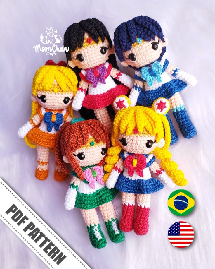 the crocheted dolls are all dressed up in different outfits and colors, including one with