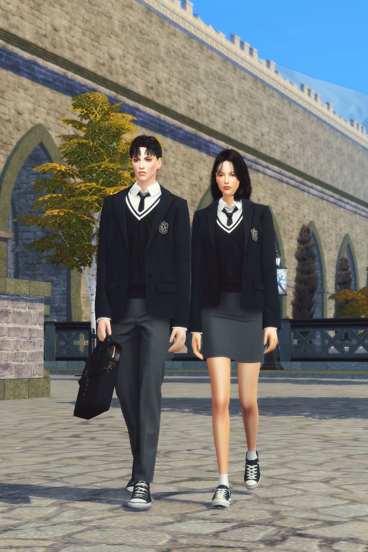 two people dressed in school uniforms are walking down the street