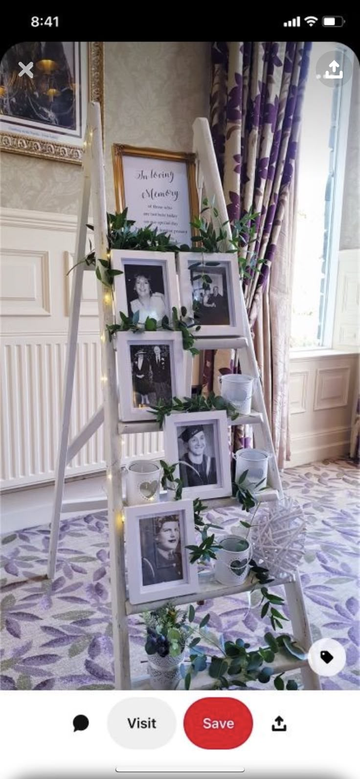 there is a ladder with pictures on it