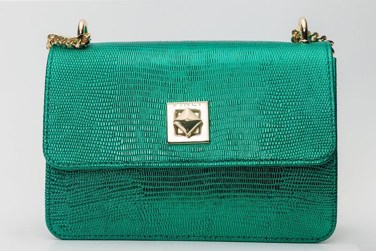 Length: 8" Height: 5" Width: 3.5" Full length of Strap: 54.5" Maple Green Metallic Leather Handbag: Timeless Elegance in a Lush Hue Supreme Metallic Leather Craftsmanship: Immerse yourself in timeless elegance with the Maple Green Metallic Leather Handbag, meticulously crafted from 100% high-quality metallic calf leather, ensuring an accessory that radiates sophistication in a lush green hue. Singular Splendor: Embrace modern simplicity with a single-compartment design, allowing the radiant meta Green Rectangular Shoulder Bag For Formal Occasions, Green Formal Bag, Green Formal Clutch Shoulder Bag, Formal Green Clutch Shoulder Bag, Green Evening Bag With Detachable Strap For Formal Occasions, Green Evening Bag With Detachable Strap For Formal Events, Green Formal Evening Bag With Detachable Strap, Luxury Green Formal Shoulder Bag, Elegant Green Evening Shoulder Bag