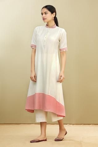 Shop for Brij White Kora Mandarin Collar Tunic for Women Online at Aza Fashions White Fitted Tunic Kurta, White Straight Kurta Tunic For Spring, White Straight Kurta Tunic, Fitted White Cotton Tunic, White Short Sleeve Kurta For Spring, Elegant White Kurta With Embroidered Neckline, Fitted Cream Kurta For Summer, White Embroidered Neckline Kurta For Spring, White Embroidered Kurta For Spring