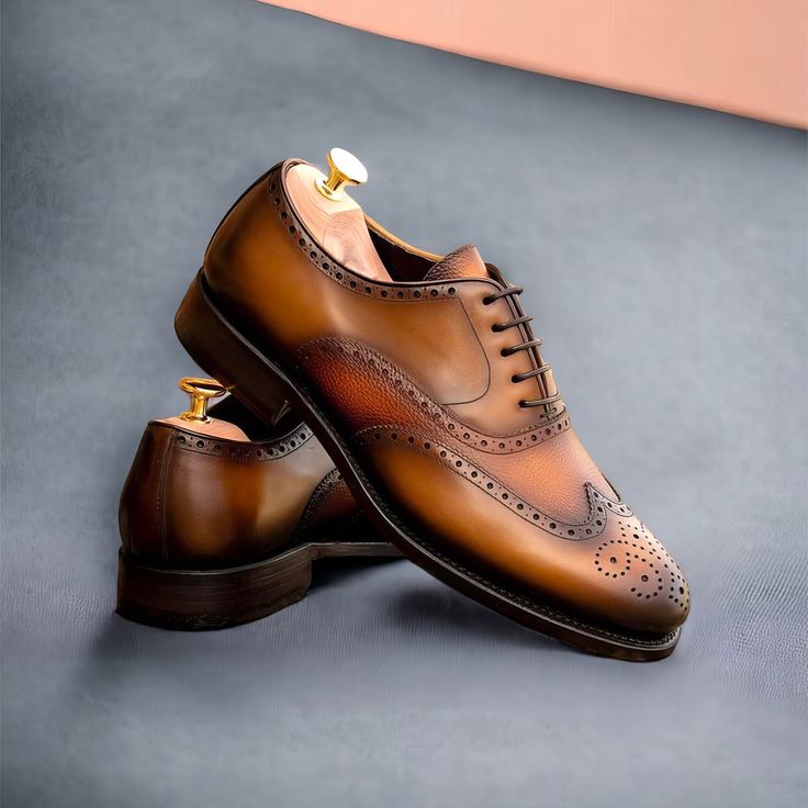 Similar to a Full Brogue, the Long Wingtip Blucher is unique in that one brogue panel extends from the toecap all the way to the heel of the shoe. Like a Full Brogue, the Long Wingtip Blucher is a classic style suitable for formal occasions and office wear alike. The Details: Materials: medium brown painted calf leather + medium brown full grain calf leather Lining: tan calf leather Sole: Goodyear leather sole Last: Zurigo - Rounded Toe for Traditional English Look The Fine Print: Shoe productio Briefcase Women, The Fine Print, Golf Shoes Mens, Traditional English, Brogue Shoes, Fine Print, Crossbody Bag Women, Trainer Sneakers, Mens Shoes Boots