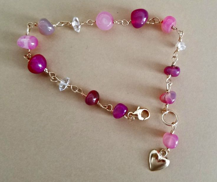 This pretty bracelet is 8 inches long. It consists of pink agate gemstones and Herkimer diamonds. Done in 14K gold filled. This bracelet will arrive to you beautifully gift boxed. Pink Gemstone Bracelets For Gift, Elegant Pink Crystal Bracelet For Valentine's Day, Elegant Pink Heart Bracelet As Gift, Pink Gemstone Beads Bracelets As Gift, Pink Crystal Gemstone Bracelet As Gift, Pink Gemstone Bracelets For Jewelry Making, Pink Crystal Gemstone Bracelet For Gift, Pink Bracelet With Extender, Elegant Pink Bracelet For Valentine's Day