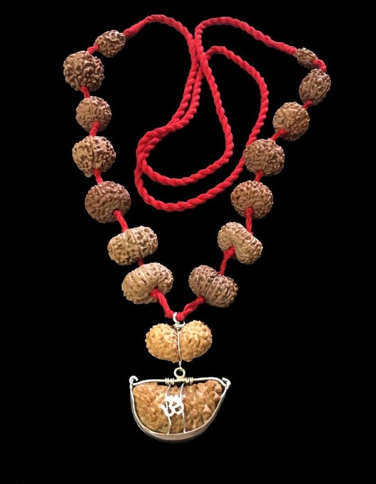 "Indonesian Siddha Mala- \"For the successful achievers and ambitious people who want to reach the top level, wearing of all 1 to 14 Mukhi Rudraksha is considered auspicious by the great epics. You may get everything that you can dream of. for success in your life. This is the most powerful healing mala. According to Puranas, a person who wears Rudraksha from 1 to 14 Mukhi becomes Lord Shiva Incarnate. This mala maybe worn or kept at the altar for worship, or even carried along in a pouch. This Hand-strung Red Mala As A Gift, Red Hand-strung Mala As Gift, Handmade Fusion Jewelry For Puja, Adjustable Red Jewelry For Navratri, Traditional Red Mala For Diwali, Spiritual Multicolor Jewelry For Navratri, Multicolor Spiritual Jewelry For Puja, Silver Mala For Festivals, Handmade Fusion Style Necklace For Puja