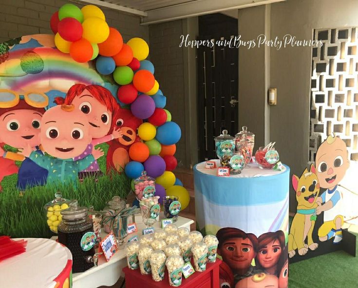 an image of a birthday party with balloons and decorations on the table for children's birthday