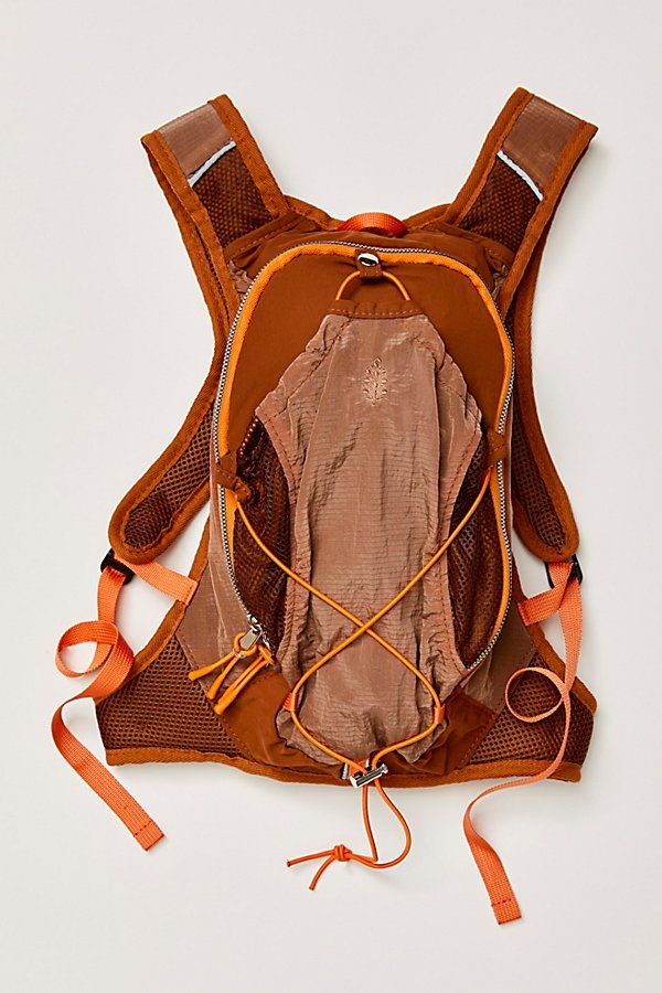 the back of a backpack with orange straps