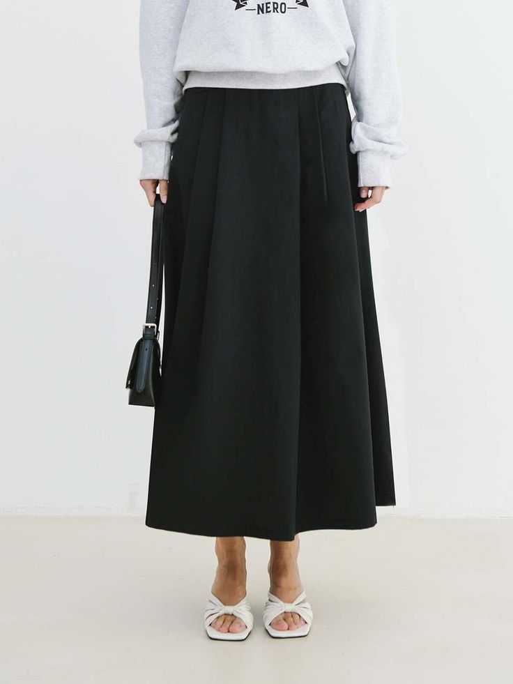 This is a comfortable and trendy skirt by PLUNASTUDIO that is made out of high quality cotton and nylon blend fabric. With unique design detail with trendy look, it will stand out from your casual and young daily outfit.- Elastic half waistband- Back zipper closure- Minimal flap pocket and side pocket detail- Voluminous full silhouette Pleated Cotton Midi Skirt, Relaxed Cotton Midi Skirt, Cotton Pleated Midi Skirt, Spring Black Cotton Skirt, High-waisted Flowy Cotton Skirt, Chic Cotton Flowy Skirt, Cotton Pleated Skirt For Workwear In Fall, Fall Cotton Pleated Midi Skirt, Fall Cotton Midi Pleated Skirt