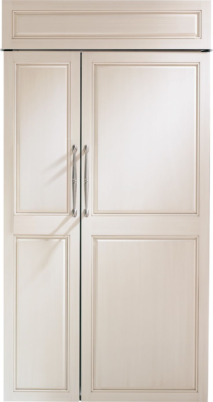 a white refrigerator freezer sitting inside of a kitchen