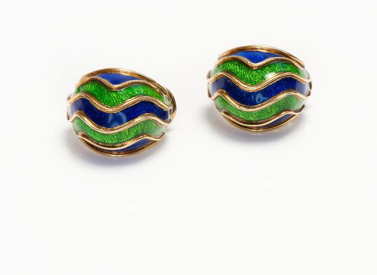 Tiffany & Co. 18K Gold Enamel Earrings Vintage 18K yellow gold blue and green enamel earrings by Tiffany & Co. Weight 27 Grams. Signed Tiffany 18K. Indulge in the timeless elegance of these Tiffany & Co. 18K Gold Blue and Green Enamel Earrings, a striking fusion of luxury and artistry. Crafted with meticulous attention to detail, these earrings feature vibrant blue and green enamel, beautifully contrasted against the warm glow of 18K gold. A true testament to Tiffany & Co.'s legacy of exceptiona Haute Jewelry, Tiffany Earrings, Vintage Tiffany, Genuine Love, Tiffany Co Jewelry, Enamel Earrings, Green Enamel, Gold Enamel, Earrings Vintage