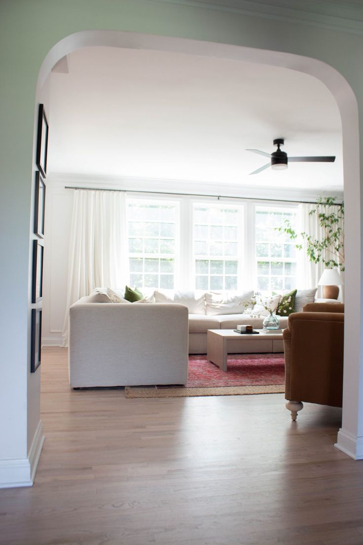 the living room is clean and ready to be used as an office or family room