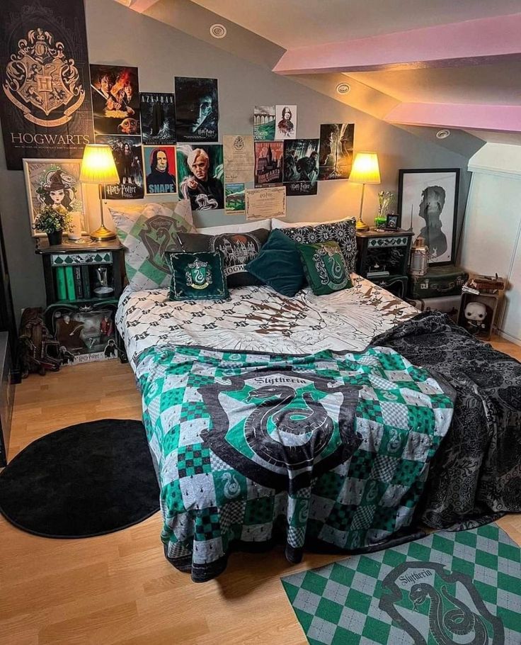 a bed room with a neatly made bed and lots of pictures on the wall above it