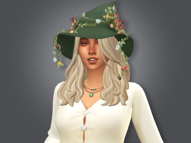 a woman wearing a green hat with flowers on it's brim and long blonde hair