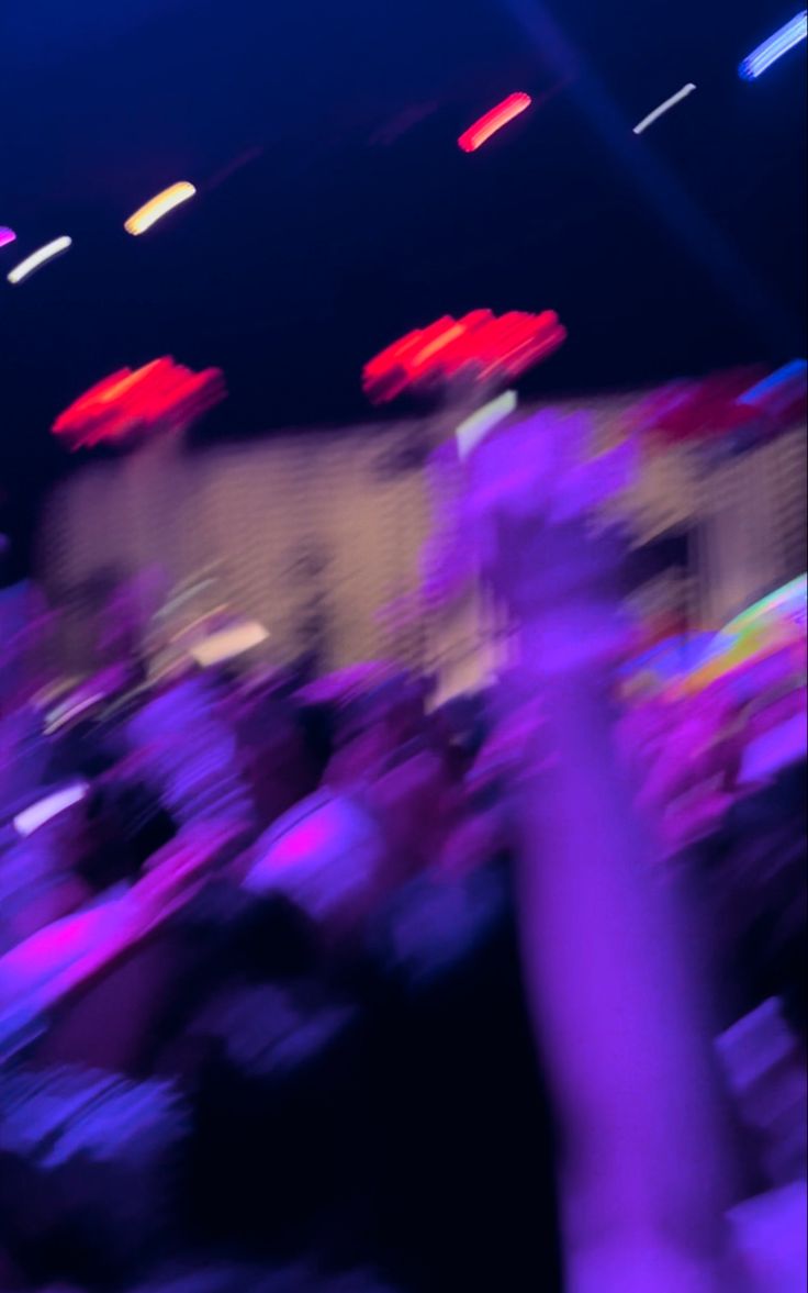 blurry photograph of people at an event