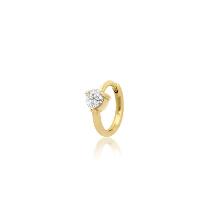 You asked, we answered! Our Cartilage Hoop with Brilliant Cut Diamond Accent is crafted in polished 18-karat yellow gold and features a sparkling diamond accent and hinged closure. Let's be honest, you don't need to reserve this one for your cartilage either, we love it in just about any piercing and layered with everything. Wear yours as an everyday staple. Sold as a single Hinged closure Measures 7mm in diameter Made with love in Los Angeles Complimentary gift wrapping provided Classic Gold Huggie Earrings With Brilliant Cut, Elegant Hoop Septum Ring With Prong Setting, Elegant White Gold Hoop Septum Ring, Elegant Hoop Septum Ring For Anniversary, Yellow Gold Small Hoop Rings With Vvs Clarity, Timeless Gold Huggie Earrings With Brilliant Cut, Yellow Gold Small Hoop Ring With Prong Setting, Elegant 14k Gold Septum Ring For Anniversary, Elegant Small Hoop Gold Septum Ring