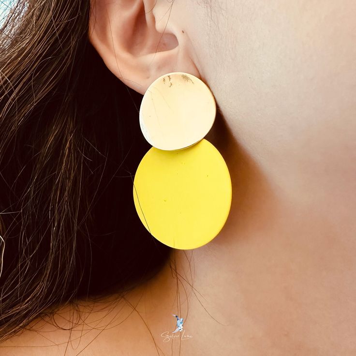 Get ready for a night out with this cool geometric fashion earrings, features a matte colorful circle and gold circles, simple, stylish, elegant design, can be worn with your favorite outfit. Weight: 8g/earringMaterials: AlloyFinish: gold, sprayed colors Jewelry Care: See more information about how to care for your jewelry here. Shipping Policy: Orders will be shipped within 1-3 business days. Economy shipping will take 7-14 days to arrive and standard shipping is 1- 4 days for U.S. orders. Inte Trendy Circular Summer Earrings, Trendy Circular Earrings For Summer, Trendy Circle Earrings, Colorful Circle, Geometric Fashion, Geometric Circle, Jewelry Care, Fashion Earrings, Statement Earrings