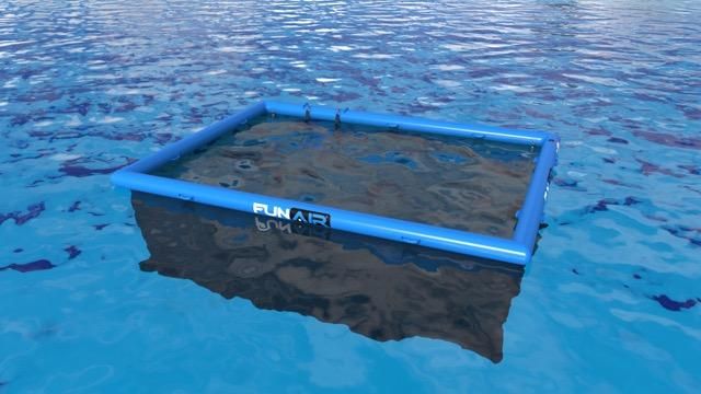 an empty swimming pool in the middle of water