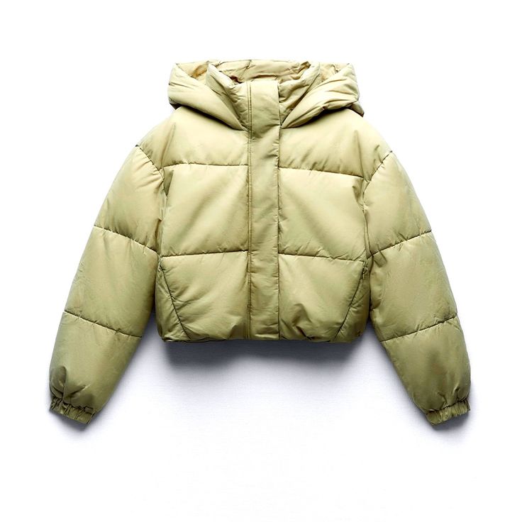 Puffer Anorak With Thermal Insulation To Withstand Temperatures As Low As -4f With High Collar Hood. Khaki Puffer Jacket With Pockets For Cold Weather, Khaki Puffer Jacket For Winter Streetwear, Khaki Winter Puffer Jacket For Streetwear, Casual Spring Puffer Windbreaker, Beige Puffer Jacket With Detachable Hood For Outdoor, Hooded Beige Puffer Outerwear, Oversized Khaki Windbreaker For Winter, Casual Khaki Puffer Jacket With Pockets, Khaki Windbreaker For Cold Weather In Fall