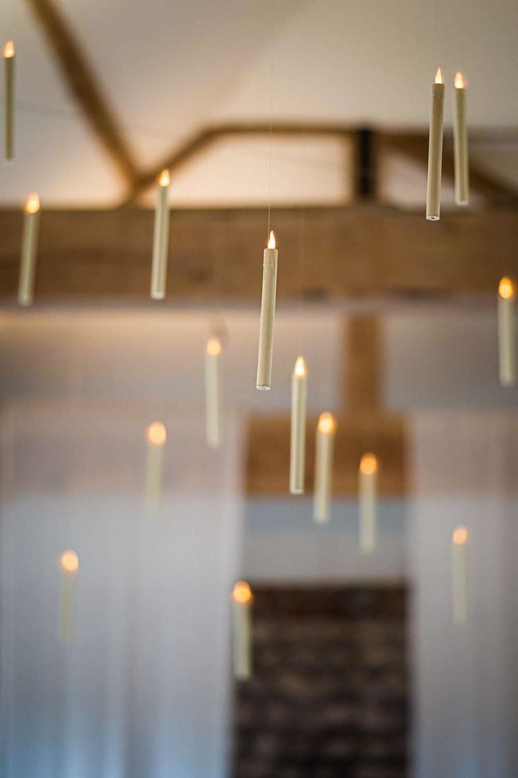 Image shows a Harry Potter themed wedding with hanging candles throughout the ceiling at Farbridge Barns. Photo credit Lucy Davis Photography Halloween Decor Hanging From Ceiling, Candle Hanging From Ceiling, Floating Candles Wedding Harry Potter, Harry Potter Candle Holder, Floating Candle Harry Potter, How To Hang Candles From Ceiling, Hanging Floating Candles, Hanging Candles From Ceiling, Harry Potter Lights From Ceiling