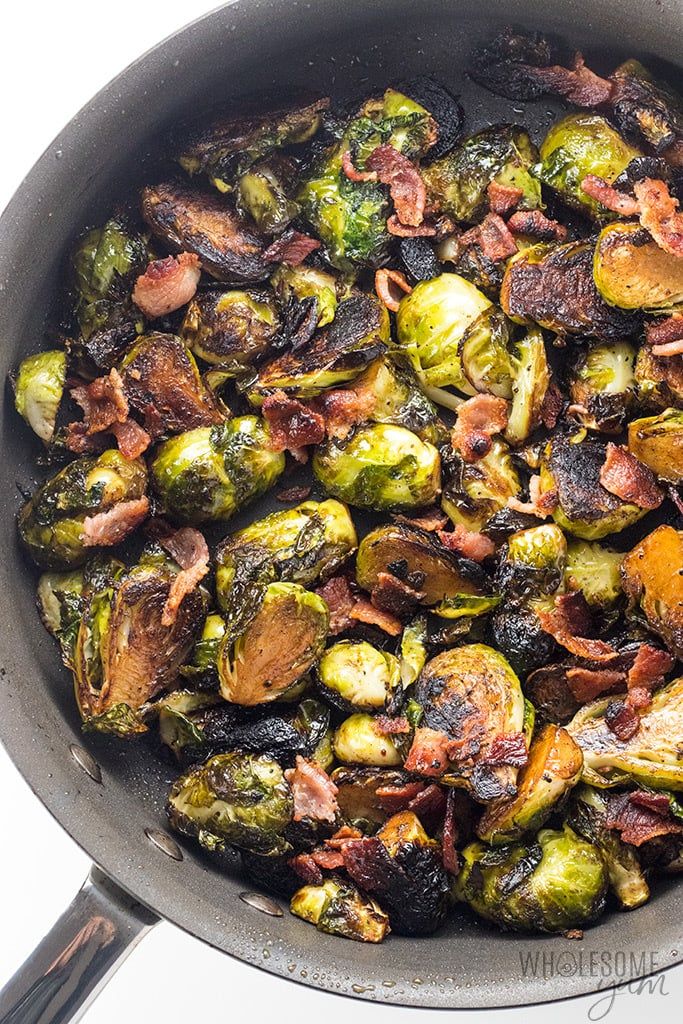 brussel sprouts with bacon cooking in a pan