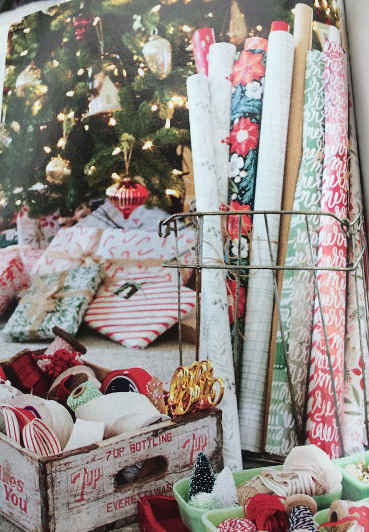 an open magazine with christmas wrapping on the cover