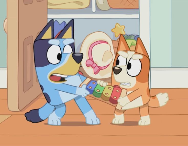 two cartoon dogs playing with each other in front of a refrigerator