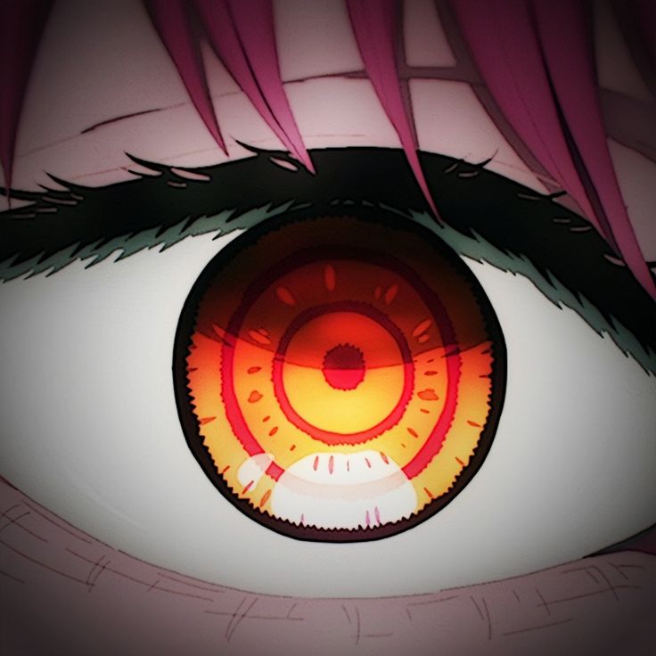 an eye with pink hair is shown in this image