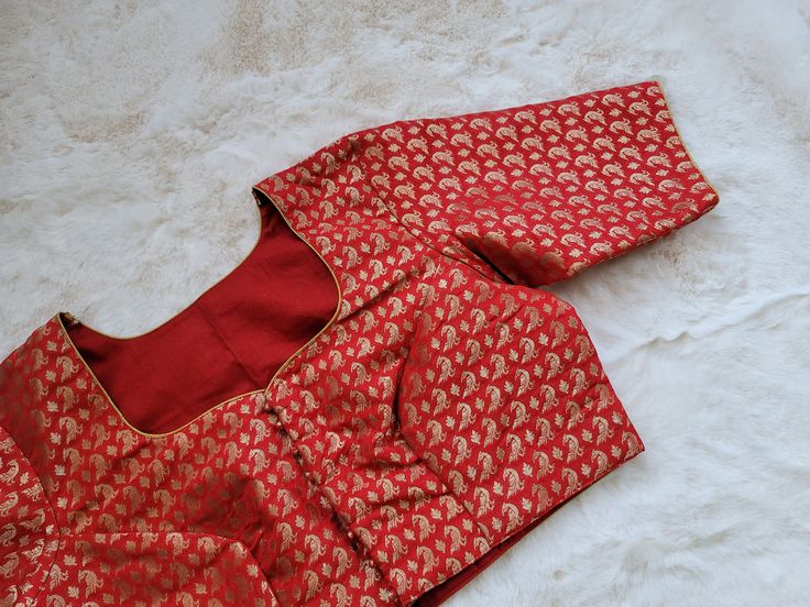 Blouse stitched - Yes Blouse size 40 with inner margins expandable upto 46 For Blouse Size alteration 38 can be done on request. Elegant Red Cotton Silk Blouse, Red Unstitched Cotton Silk Blouse, Traditional Red Cotton Silk Blouse, Red Cotton Silk Blouse With Cutdana, Red Cutdana Cotton Silk Blouse, Red Cotton Silk Blouse For Festivals, Red Long Sleeve Blouse With Cutdana, Fitted Padded Blouse In Cotton Silk, Festive Fitted Blouse With Back Yoke