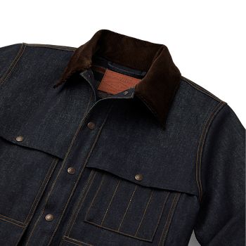 Our new Lined Denim Cruiser Jacket is a tough variant of our 1914-patented classic. It fuses the utility of our multi-pocket forestry jacket with the historic fabric that earned a reputation for toughness in the mid-1800s gold rush. The interior is lined with a special wool blend for added warmth. The preshrunk raw denim will develop its own unique fade and wear pattern, telling the story of rugged use over the years. Snap- front and-adjustable cuffs. Corduroy-lined collar. | Filson Lined Denim Cruiser Jacket Raw Indigo Size Small Rugged Denim Jacket With Pockets For Winter, Fall Utility Denim Jacket For Outdoors, Utility Denim Jacket For Fall Outdoors, Utility Style Denim Jacket With Pockets For Outdoor, Utility Denim Jacket With Pockets For Outdoor, Rugged Dark Wash Cotton Outerwear, Outdoor Utility Jacket With Double-needle Sleeve, Rugged Denim Jacket With Pockets For Fall, Fall Outdoor Denim Jacket With Flap Pockets