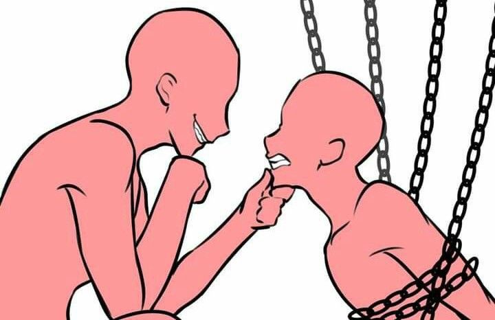 an image of two people in chains with one man touching the other's face