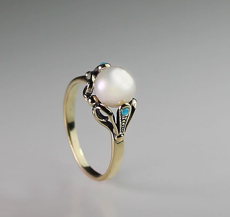 "14K Gold ring delicate detailed with real round pearl and 2 small turquoise . vintage victorian design I make it any size you want. weight : 3.1 gram gemstone size : main pearl - 7 m\"m worldwide free shipping." Elegant Yellow Gold Turquoise Cabochon Ring, Antique Turquoise Round Ring For Wedding, Antique Turquoise Ring For Wedding, Gold Turquoise Ring For Wedding, Fine Jewelry, Gold Turquoise Ring For Wedding, Antique Round Turquoise Wedding Ring, 14k Gold Turquoise Ring For Wedding, Elegant Yellow Gold Turquoise Ring For Formal Occasions, Elegant Turquoise Cabochon Ring