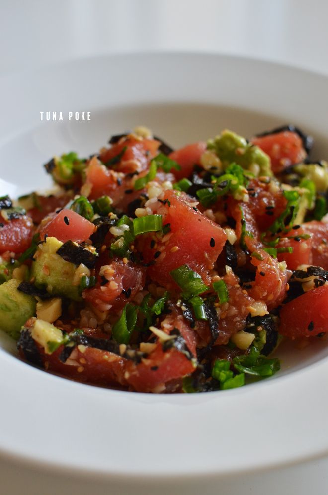 a white bowl filled with chopped up vegetables