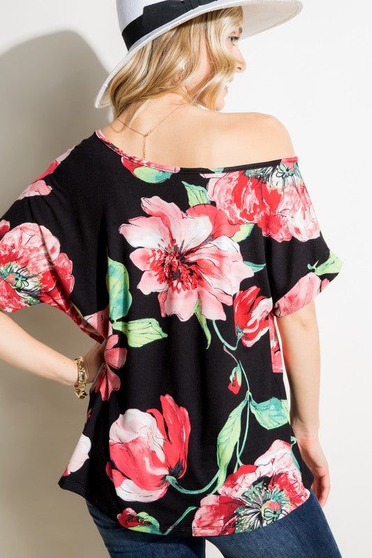 Large scale floral print blooms on this soft rayon jersey top designed in a one-shoulder silhouette with a loose fit. Material: 95% rayon 5% spandex Stretch: Moderate stretch Care: Machine wash cold, gentle cycle, tumble dry low. Made in USA Product Measurements S: 36.0-38.0 (Bust) M: 38.0-40.0 (Bust) L: 40.0-42.0 (Bust) Drop Shoulder Top, Large Scale Floral, Boxy Top, Floral Fit, Fuchsia Color, One Shoulder Tops, Boat Neckline, Jersey Top, Chic Boutique