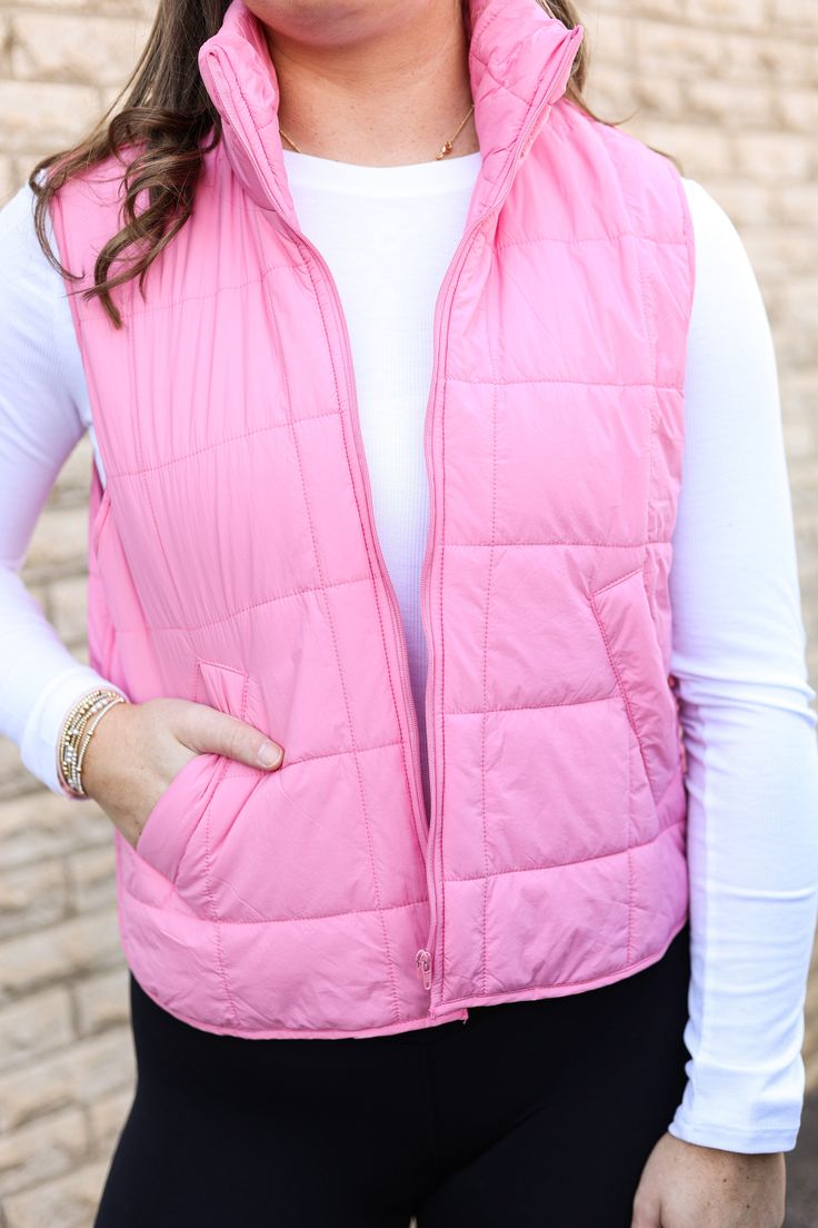 Our "Kasie Vest" is a light pink vest that zips up the front and has front pockets. Our model is wearing a size Small. Pink Vest Outerwear For Spring, Pink Sleeveless Vest With Pockets, Casual Pink Vest Outerwear, Trendy Spring Vest With Zipper Closure, Casual Pink Sleeveless Outerwear, Pink Sleeveless Outerwear For Fall, Sleeveless Pink Outerwear For Fall, Pink Casual Winter Vest, Casual Pink Winter Vest