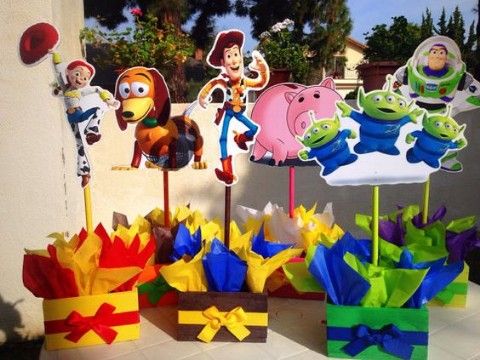 toy story birthday centerpieces on display in front of a house