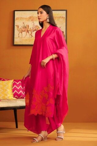 Hot pink straight kurta with floral applique patch work on the hem and sleeves. Paired with a trouser and dupatta. - Aza Fashions Spring Cotton Silk Sets With Zari Work, Pink Kurta With Sheer Dupatta For Summer, Red Sets With Zari Work For Spring, Summer Silk Salwar Kameez With Traditional Drape, Silk Salwar Kameez With Traditional Drape For Summer, Palazzo Set With Dupatta For Celebration, Spring Red Dupatta, Red Spring Dupatta, Pink Unstitched Suit In Traditional Drape