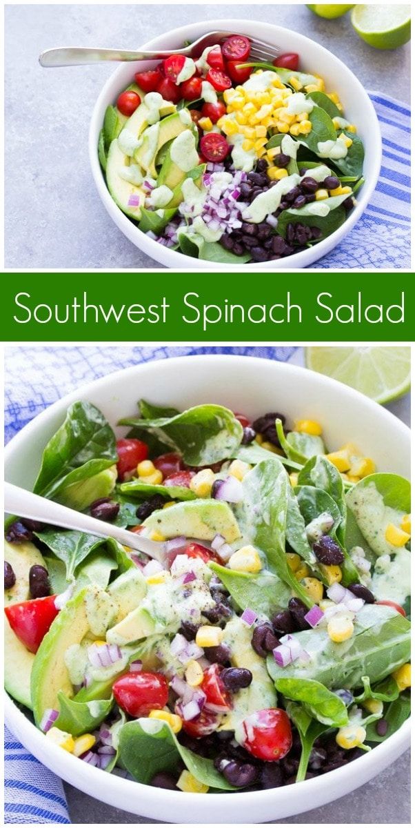 southwest spinach salad with avocado, corn and black beans in a white bowl