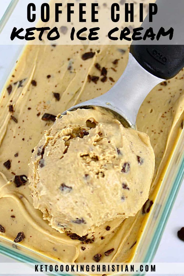 a scoop of coffee chip keto ice cream in a glass container with a spoon