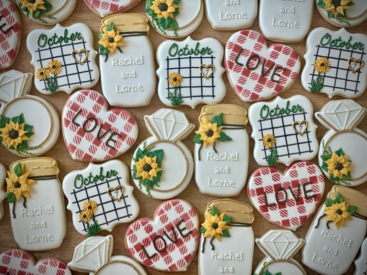 decorated cookies are displayed on a table