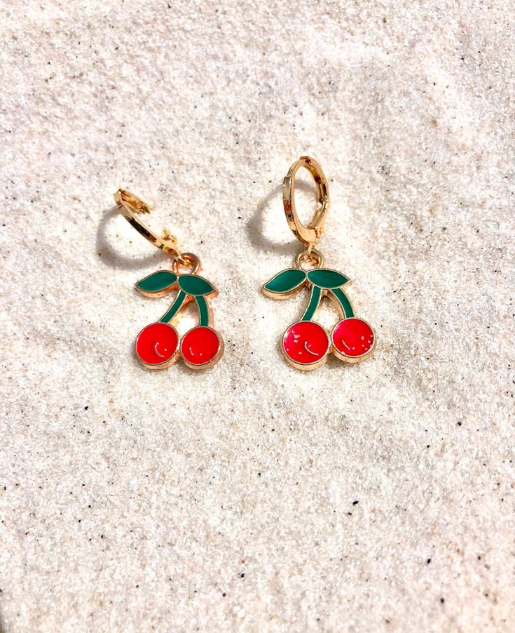 dainty cherry earrings 🍒 Trendy Cherry Dangle Earrings, Trendy Cherry-colored Earrings, Cute Single Dangle Earring, Dainty Red Earrings For Everyday, Trendy Round Flower Earrings As Gift, Trendy Round Flower Earrings For Gift, Dainty Dangle Earrings For Summer, Playful Red Nickel-free Jewelry, Cherry Color Trendy Nickel-free Jewelry